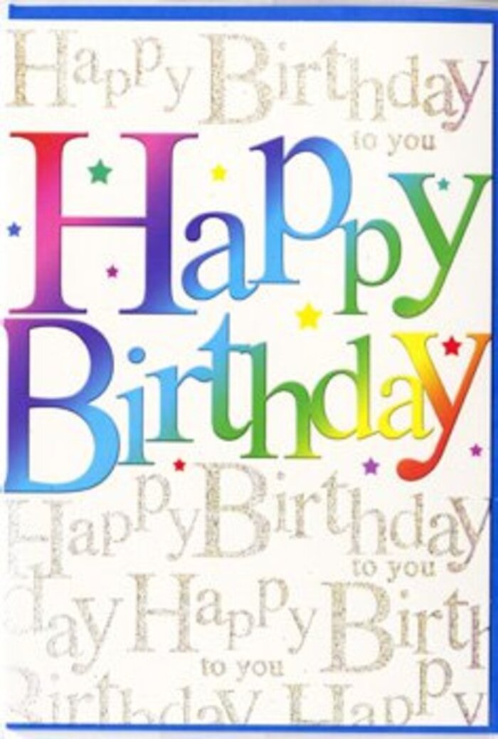 In this image, a vibrant birthday card stands upright, radiating joy in the same easy, welcoming way Reigate's independent shops do on a busy weekend. The focal point is the greeting Happy Birthday, written in substantial, gently rounded capital letters that stretch across the centre of the card like a festive banner. Each letter is awash with colour, forming a smooth rainbow sequence from bold reds and pinks, through mandarin orange and buttery yellow, into fresh greens, aquas, deep blues and finally velvety violets. The colours blend together with a misty, airbrushed transition, giving each character a soft, almost glowing quality, as though backlit by gentle daylight filtering through a window above Reigate High Street. Behind these prominent letters, a repeating layer of cursive script spells out Happy Birthday to you in fine, gold writing. The script snakes across the background in looping, handwritten lines, overlapping and weaving around the main text like a chorus of quiet, repeated well-wishes. The gold ink shimmers delicately rather than glittering harshly, adding a sense of refined sparkle that feels elegant, not overdone. The background tone is a warm, creamy white, which helps the rainbow letters stand out while maintaining a calm, balanced feel. Small splashes of multicoloured dots and tiny star shapes are scattered around the central phrase, suggesting party confetti tossed into the air at a birthday gathering in a Reigate garden or a cosy home near Wray Common. The finish of the card appears smooth with a light sheen, and you can almost imagine the slight texture where the gold script sits. Altogether, the design gives a sense of sincere, cheerful celebration, perfectly suited to accompany a fresh bouquet delivered locally across Reigate for a much-loved birthday.